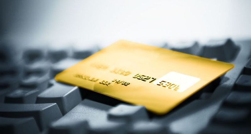 1106552 - credit card and computer keyboard. online shopping.
